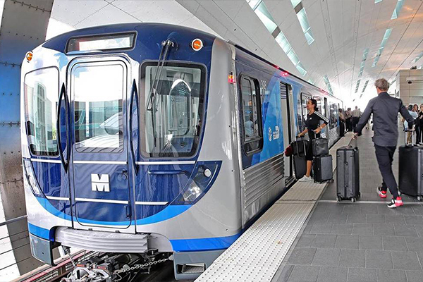 Passengers Loading Metrorail Train